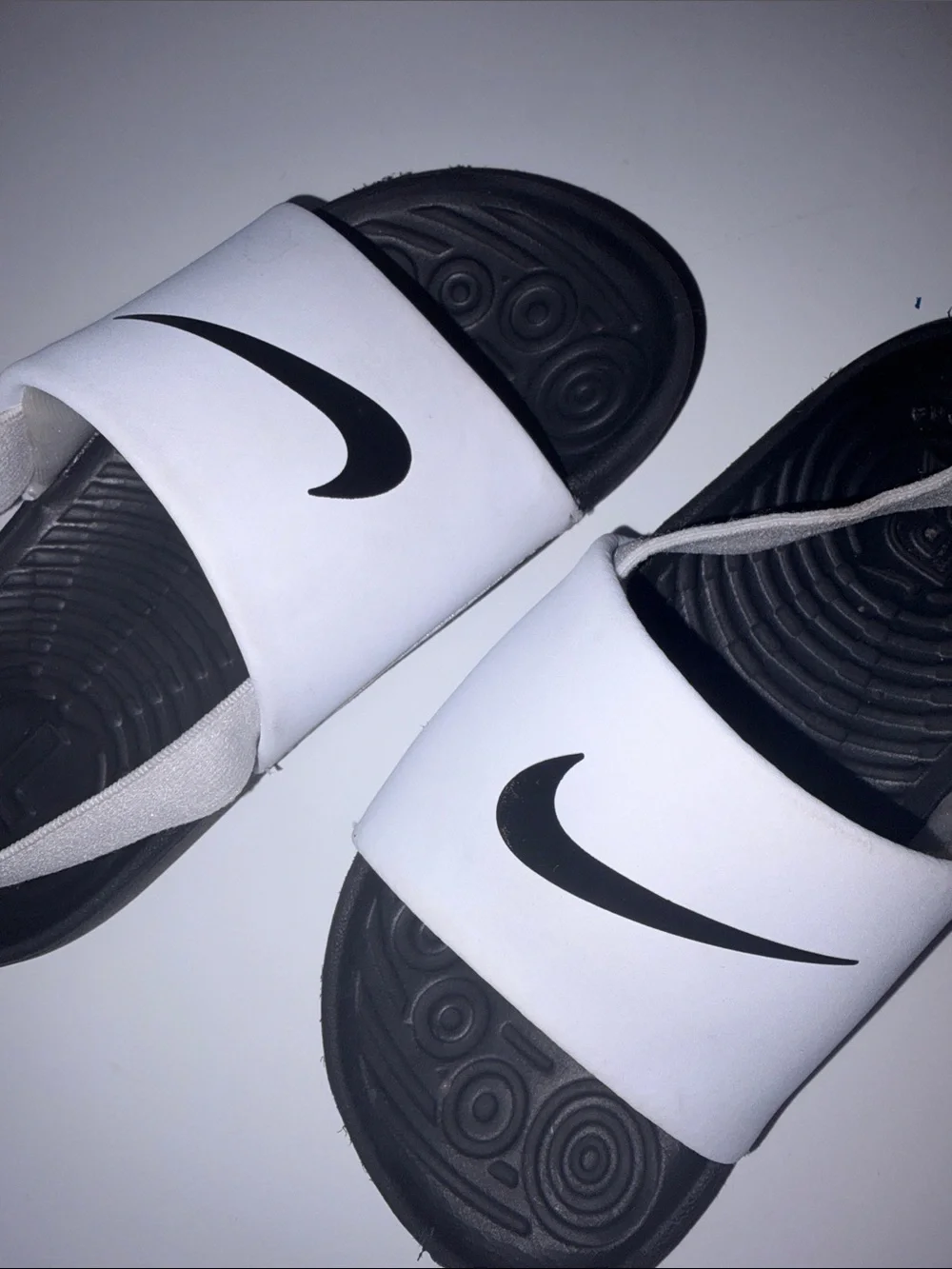 Nike Kids White and Black Slide Sandals with Swoosh